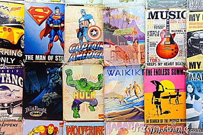 Old Comics and signs for sale at a Waikiki Market Stall Editorial Stock Photo