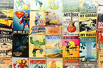 Old Comics and signs for sale at a Waikiki Market Stall Editorial Stock Photo