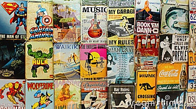 Old Comics and signs for sale at a Waikiki Market Stall Editorial Stock Photo