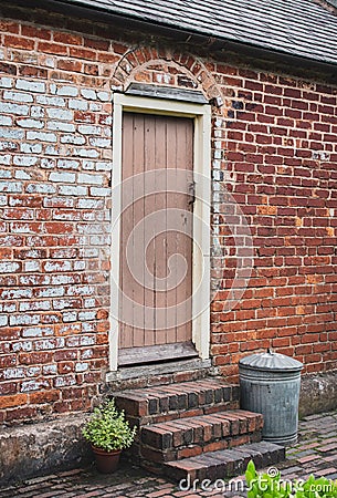 An old back door to a Victorian coal miners cottage. Stock Photo