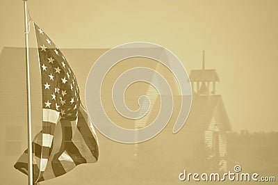 Old Country Schoolhouse with an American Flag Stock Photo