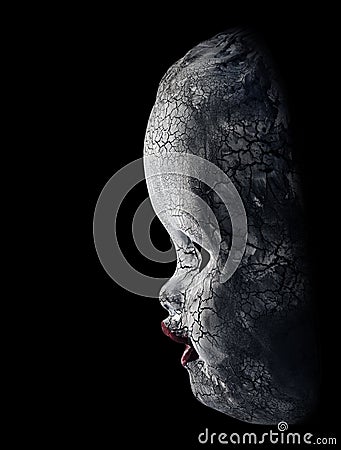 Old cracked creepy doll head isolated on black Stock Photo