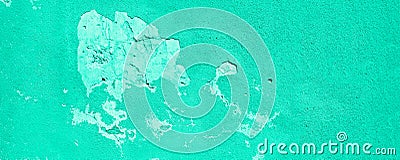 Old cracked mint wall. Painted texture background in trendy turquoise color. Banner. Trendy green and turquoise color Stock Photo