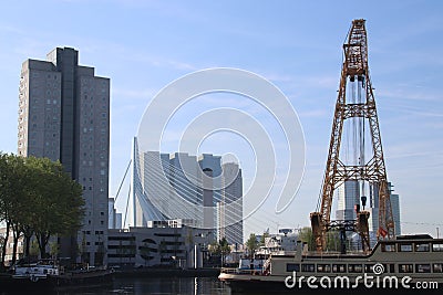Old cranes, ships, towers, trains and other parts of the harbor for public exhibitation in the Leuvehaven in Rotterdam Editorial Stock Photo