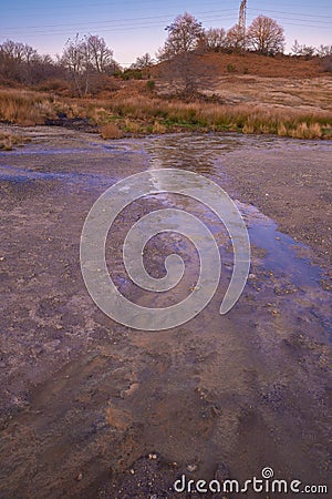 Old Crater in Manziana - carbon dioxide coming out of the earth through water and forming bubbles Stock Photo