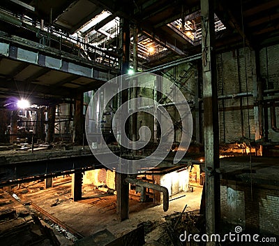 Old creepy, dark, decaying, destructive, dirty factory Stock Photo