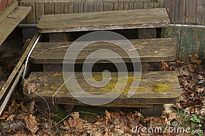 Old crooked wooden porch Stock Photo