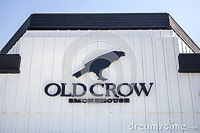Old Crow Smokehouse restaurant sign Editorial Stock Photo