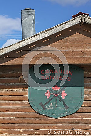 Old Crow, Yukon Territorry, Canada. 7/15/2016. Detail of the emblem of the Canadian Rangers at historical cabin. Editorial Stock Photo