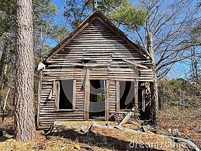 Old crumbling wooden dilapidated building front view Stock Photo