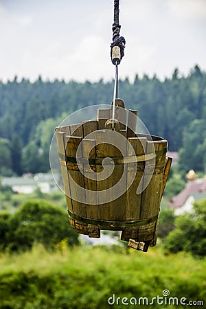 Old damage wooden bucket Stock Photo