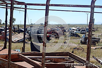 Old damaged cars in the junkyard. Car graveyard Stock Photo