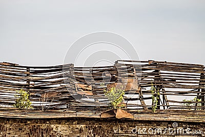 Old damaged rafter roof abandoned dilapidated building Stock Photo