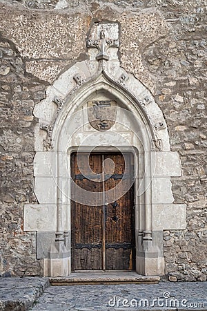 Old decorated vintage door with wood carving Stock Photo