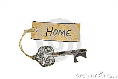 Old decorative key and handwritten tag 