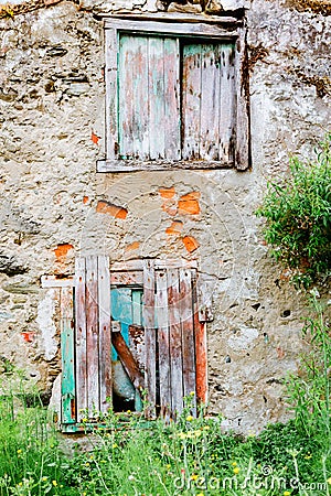 Old deserted house with wooden door Stock Photo