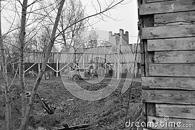 old destroyed car with wooden constructions Stock Photo