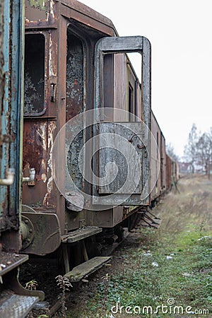 Old destroyed railway wagons. Forgotten railway station in centr Stock Photo