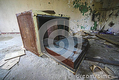 A old destroyed safe in a abandoned old house Stock Photo