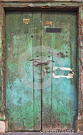 Old dilapidated wooden door. Stock Photo