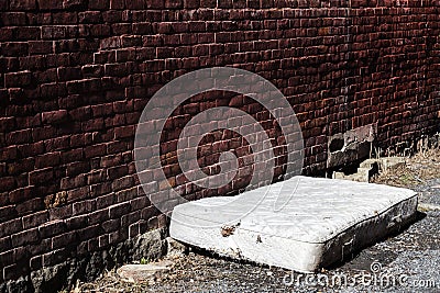 Old and dirty Abandoned Mattress Stock Photo