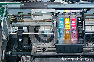 Old, dirty, disassembled ink jet printer. View of internal parts. Stock Photo