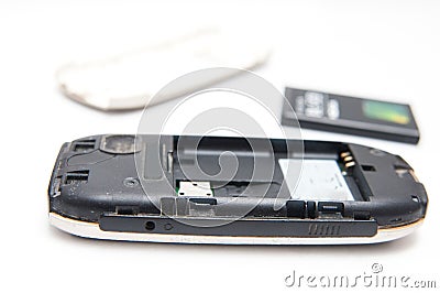 Old dirty and disassembled phone Stock Photo