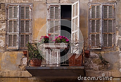 Old dirty facade flowers Jaffa Israel Stock Photo