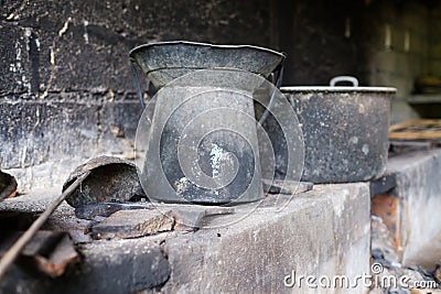 Old dirty pots in asian street kitchen Stock Photo