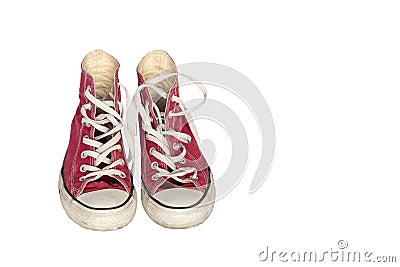 Old dirty shabby red sneakers close-up Stock Photo