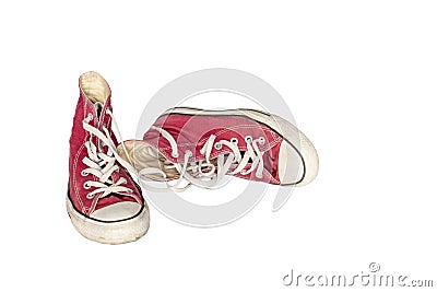 Old dirty shabby red sneakers close-up Stock Photo