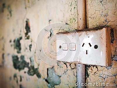 Old and dirty Wall with Standard Double Power Point Electrical in Australia. Stock Photo