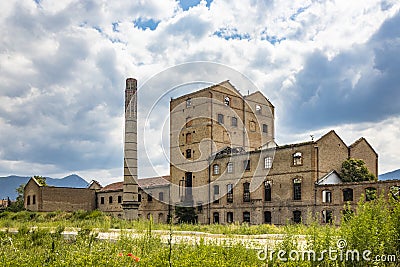 An old disused factory, abandoned and in ruins Stock Photo