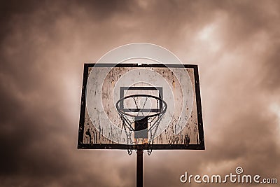 Old disused outdoor basketball hoop Stock Photo