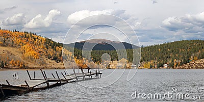 Old Dock in Mountains Stock Photo