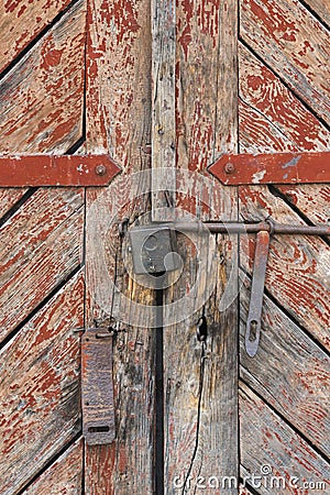 The old door locked with a padlock hanging brackets. Set of backgrounds Stock Photo