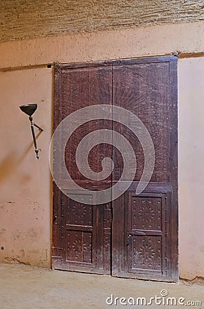 Old doors in Interior of the old granary and stable of the Heri es-Souani in Meknes, Morocco Stock Photo