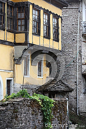 Old doors and windows damaged from weather in ancient city of Gjirokaster in Albania exploring Balkan stock photography travel Stock Photo