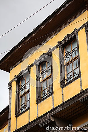 Old doors and windows damaged from weather in ancient city of Gjirokaster in Albania exploring Balkan stock photography travel Stock Photo