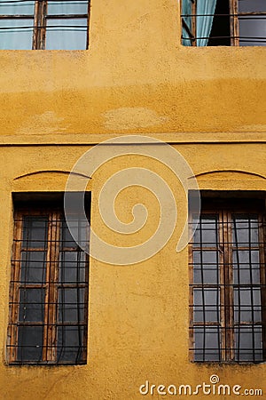 Old doors and windows damaged from weather in ancient city of Gjirokaster in Albania exploring Balkan stock photography travel Stock Photo