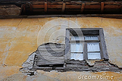 Old doors and windows damaged from weather in ancient city of Gjirokaster in Albania exploring Balkan stock photography travel Stock Photo