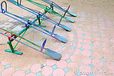 Old downed trees or seesaw playground traditional metal in school children countryside Stock Photo