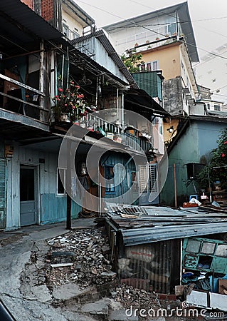 Old downgrade residence area on slopes, ancient wooden house in cyan at Da Lat, Vietnam Editorial Stock Photo