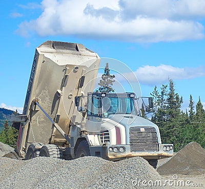 An old dumptruck at a rustic quarry in the yukon Editorial Stock Photo