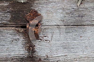 Old dusty rustic hinge on hinge box on grunge texture background. Antique Wooden Chest Stock Photo