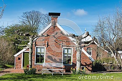 Old Dutch country cottage with espaliers Editorial Stock Photo