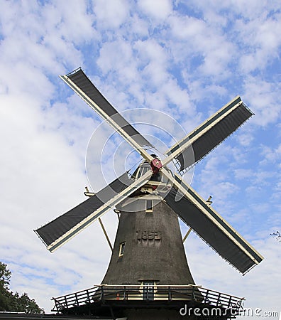 Old dutch windmill in village named Oldebroe Stock Photo