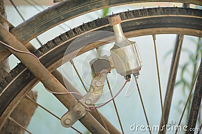 Old dynamo of a bicycle. Stock Photo