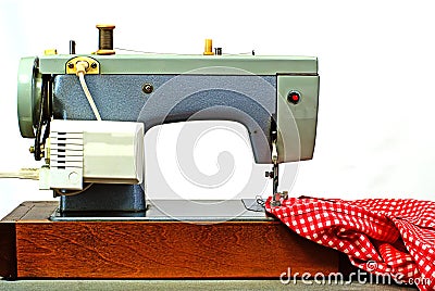 Old electrical sewing machine isolated on white Stock Photo