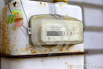 Old electricity meter with the calculation in kilowatts sealed Stock Photo